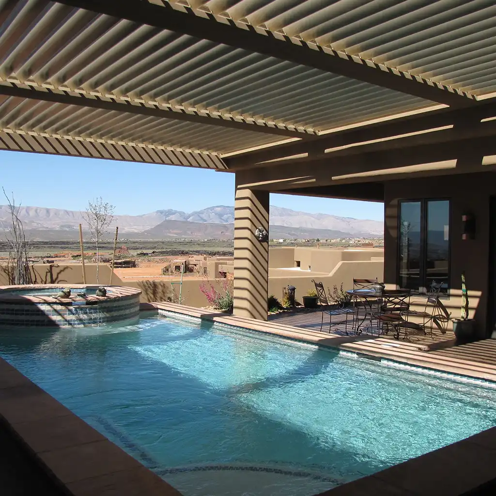 Equinox Louvered Roof with adjustable louvers providing shade over an outdoor seating area in Yuma, AZ